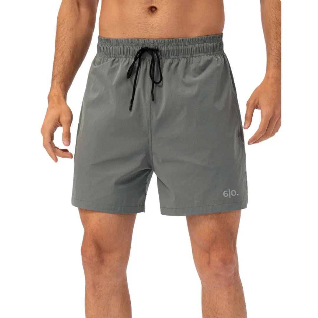 Green easy care material padel shorts for men - Six Zero padel